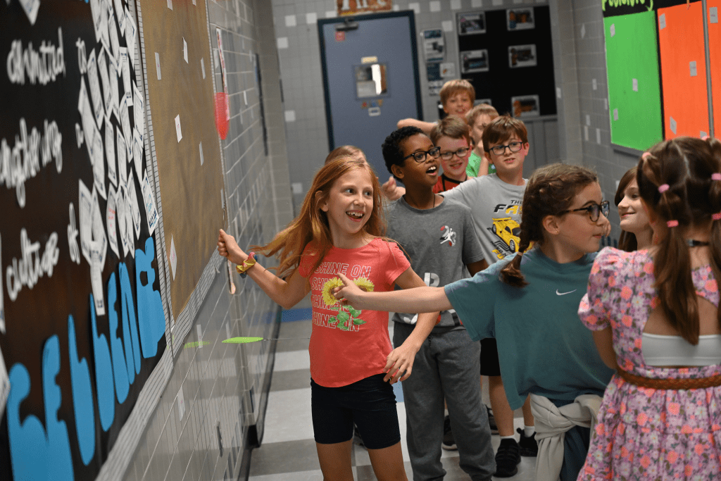 Richardson ISD STEM Magnet school students had a blast with a word-swatting competition, where they classified verbs, adjectives, and nouns.