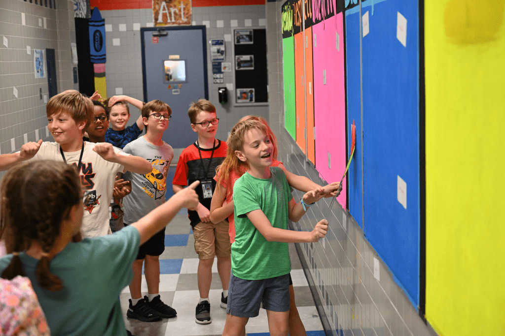 Richardson ISD STEM Magnet school students had a blast with a word-swatting competition, where they classified verbs, adjectives, and nouns.